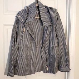 28"long. Unique piece, 3 Pockets.